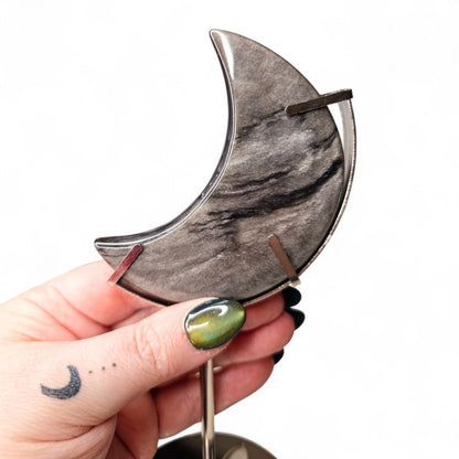 Silver Sheen Obsidian Moon with Silver Metal Stand, Black Crescent Moon Carving, Celestial Home Decor, Flashy Volcanic Glass, Witchy Gift