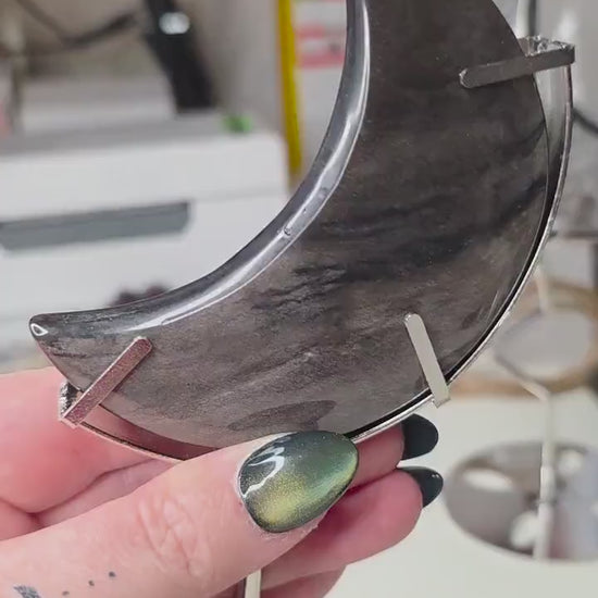 Silver Sheen Obsidian Moon with Silver Metal Stand, Black Crescent Moon Carving, Celestial Home Decor, Flashy Volcanic Glass, Witchy Gift
